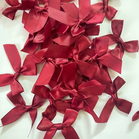 100 ببيونة لون خمري مقاس1.5cm